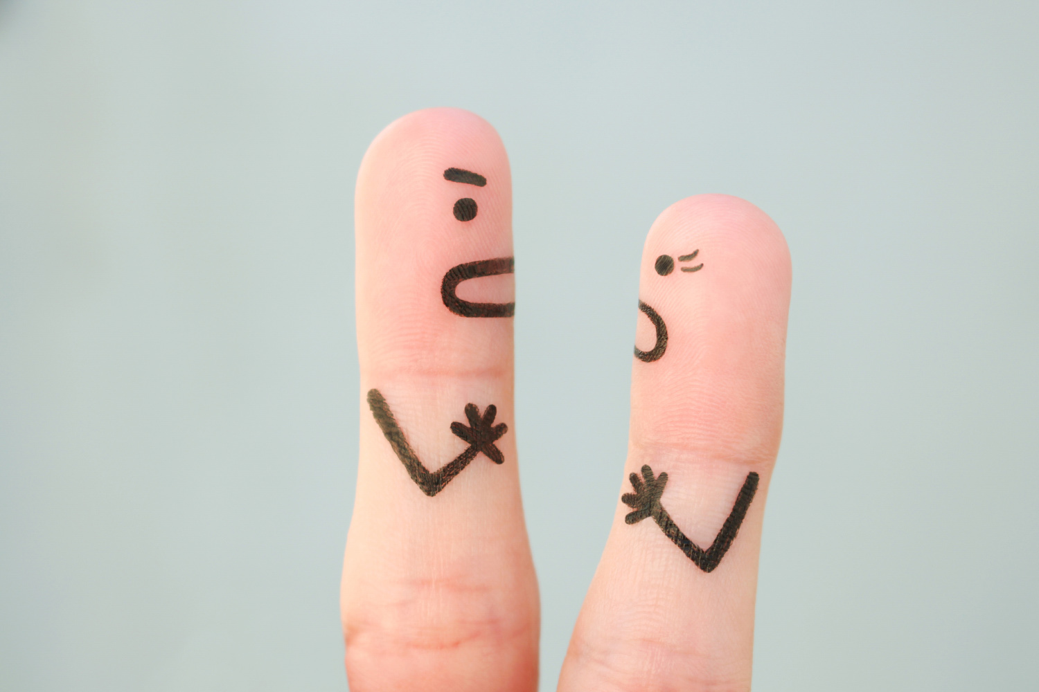 Fingers art of couple during quarrel.